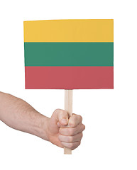 Image showing Hand holding small card - Flag of Lithuania