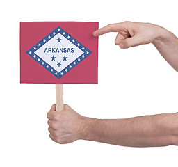 Image showing Hand holding small card - Flag of Arkansas