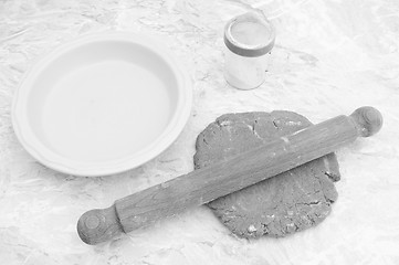 Image showing Rolling out shortcrust pastry for a pie