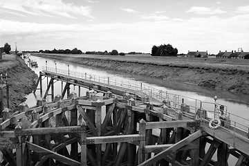 Image showing Approach on River Nene at low tide to Crosskeys Bridge