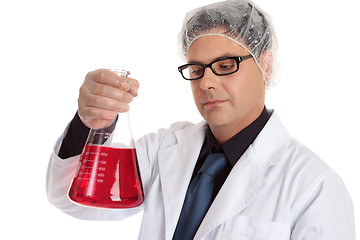 Image showing Chemist carrying large flask
