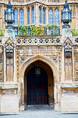 Image showing parliament in london old church door and marble antique  wall