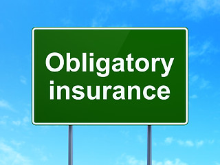 Image showing Insurance concept: Obligatory Insurance on road sign background