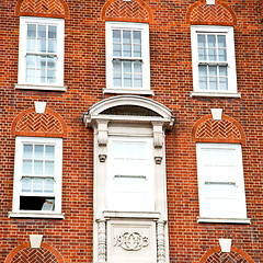 Image showing in europe london old red brick wall and      historical window