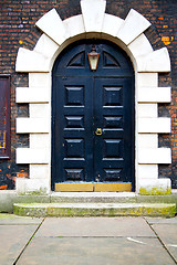 Image showing   in london  door and marble antique  wall