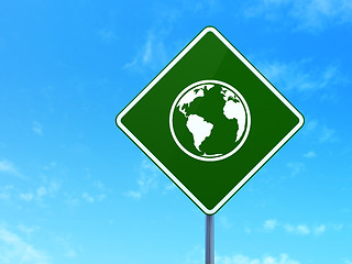 Image showing Studying concept: Globe on road sign background