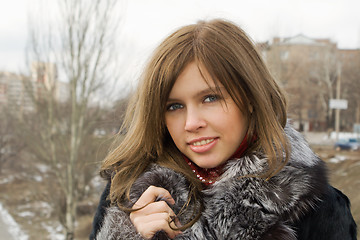 Image showing Portrait of the beautiful girl outdoor 1