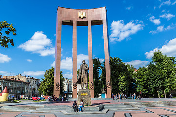 Image showing monument of national Ukrainian hero S. Bandera and great trident