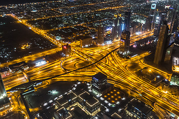 Image showing Dubai downtown night scene with city lights,