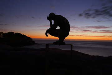 Image showing Sculpture by the Sea - Crouching Man