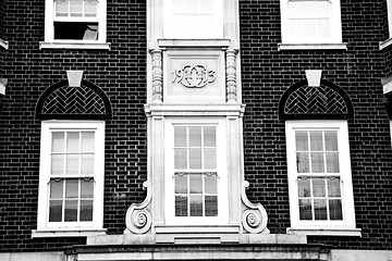 Image showing old window in europe london  red brick wall and      historical 