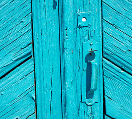 Image showing greece home texture of a blue antique wooden old door in santori