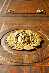 Image showing gold face  house  door     in italy  lombardy           closed  