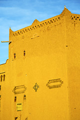 Image showing old brown construction in africa   and sky  near the tower