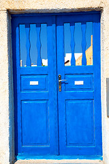 Image showing blue door in antique   wall