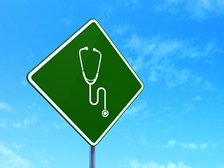 Image showing Health concept: Stethoscope on road sign background