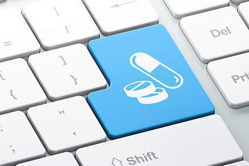 Image showing Healthcare concept: Pills on computer keyboard background