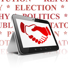 Image showing Political concept: Tablet Computer with Handshake on display