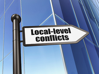 Image showing Political concept: sign Local-level Conflicts on Building background