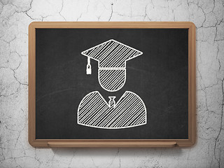 Image showing Studying concept: Student on chalkboard background