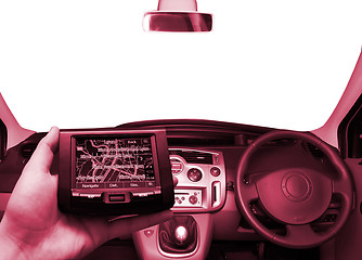 Image showing GPS Vehicle navigation system in a man hand.