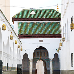 Image showing old   brick tower in morocco africa village and the sky