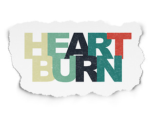 Image showing Healthcare concept: Heartburn on Torn Paper background