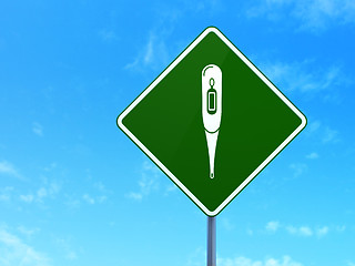 Image showing Health concept: Thermometer on road sign background
