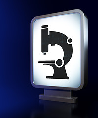Image showing Science concept: Microscope on billboard background