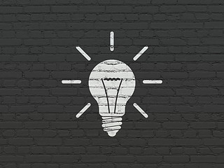 Image showing Finance concept: Light Bulb on wall background