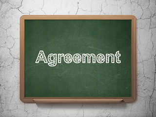 Image showing Finance concept: Agreement on chalkboard background