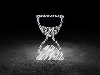 Image showing Time concept: Hourglass in grunge dark room