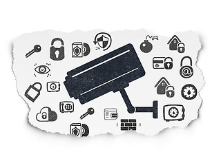 Image showing Privacy concept: Cctv Camera on Torn Paper background