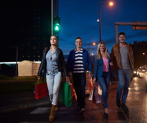 Image showing Group Of Friends Enjoying Shopping