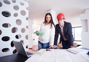 Image showing couple buying new home with real estate agent