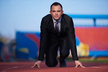 Image showing business man ready to sprint