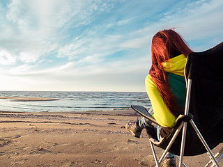 Image showing woman sitting on deckchair