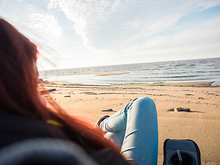 Image showing woman watching sea on beach
