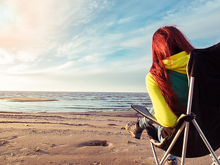 Image showing woman resting on beach