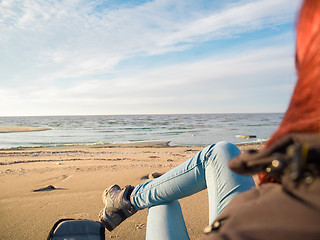 Image showing woman watching sea on beach