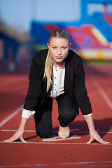 Image showing business woman ready to sprint