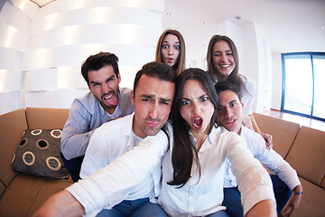 Image showing group of friends taking selfie