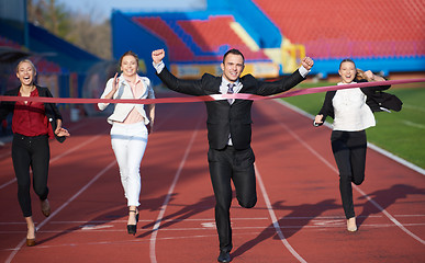 Image showing business people running on racing track