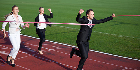 Image showing business people running on racing track