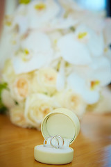 Image showing wedding bouquet and rings