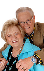 Image showing Happy mature couple hugging.