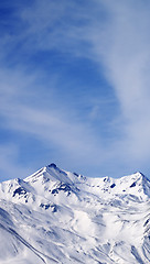 Image showing Winter snowy mountains at windy day