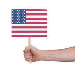 Image showing Hand holding small card - Flag of the USA