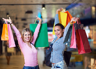 Image showing happy young girls in  shopping mall