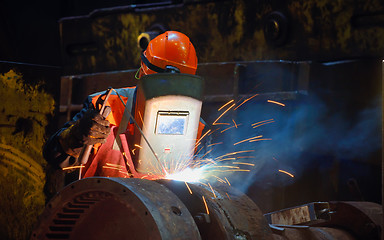Image showing Welder with protective mask 